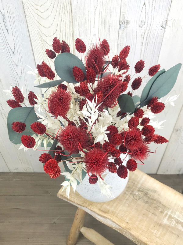 "Thistle" bouquet with red thistles and stabilized eucalyptus