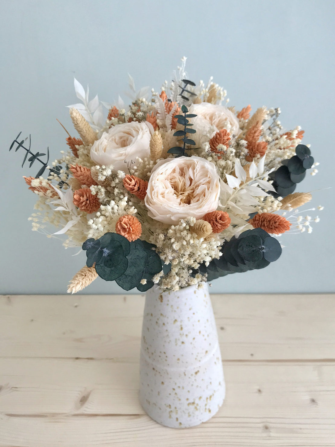 Bouquet of dried and preserved flowers, with eternal powder pink English roses and eucalyptus - 