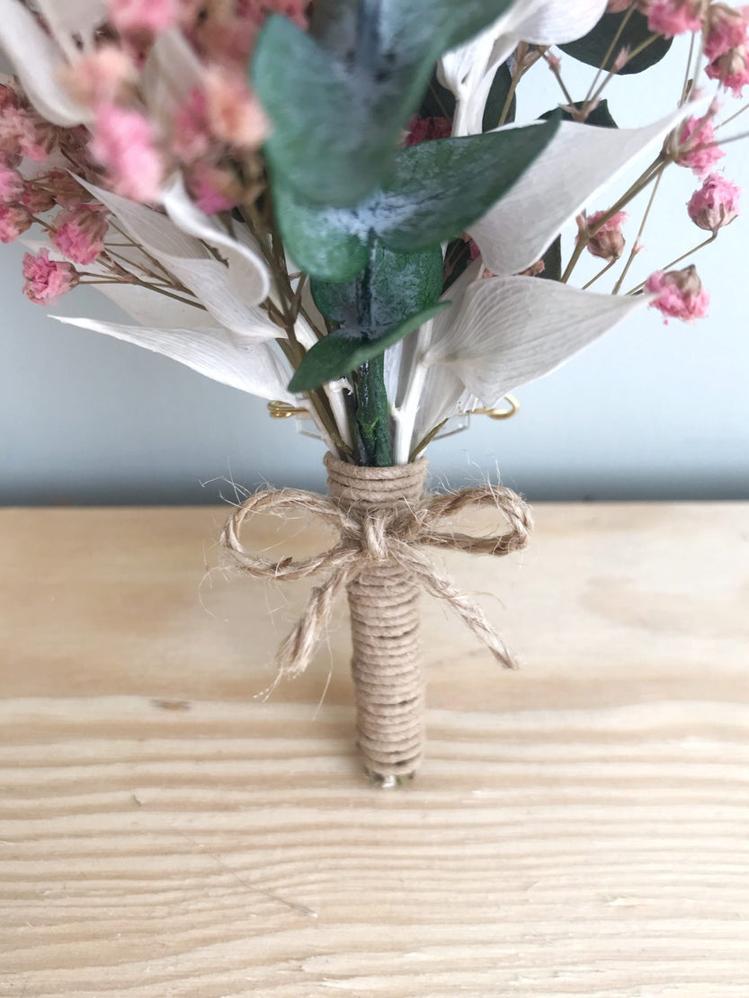 Dried flower wedding boutonniere with eternal rose, pink gypsophila and stabilized eucalyptus